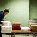 Huron senior Daniel Lee, 17, organizes pizza boxes during the all you can eat fundraiser on Friday. Daniel Brenner I AnnArbor.com